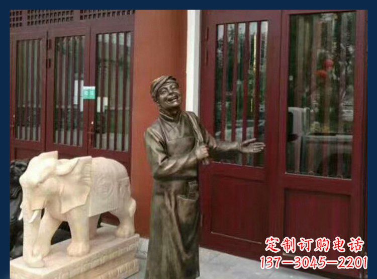 岳阳铜雕店小二酒店迎宾人物雕塑